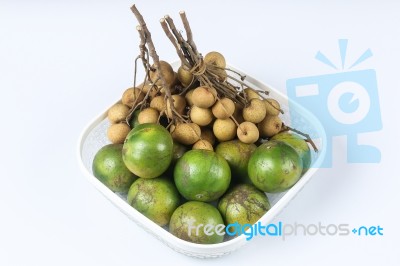 Bunchs Of Longan And Oranges Stock Photo