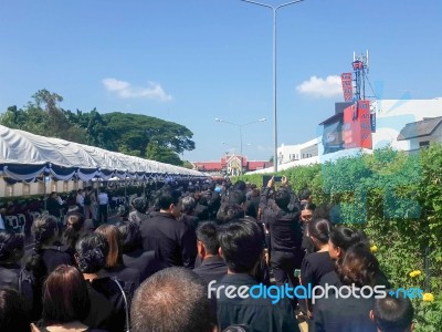 Buriram, Thailand - October 26, 2017 : Mourners Lay Flowers As A… Stock Photo