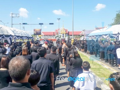 Buriram, Thailand - October 26, 2017 : Mourners Lay Flowers As A… Stock Photo