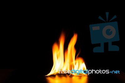 Burning Fire Flame On Black Background Stock Photo