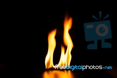 Burning Fire Flame On Black Background Stock Photo