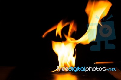 Burning Fire Flame On Black Background Stock Photo