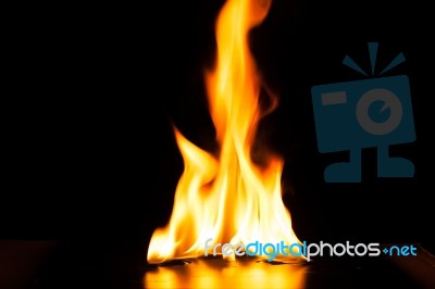 Burning Fire Flame On Black Background Stock Photo