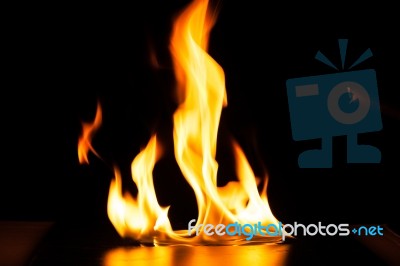 Burning Fire Flame On Black Background Stock Photo