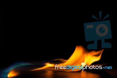 Burning Fire Flame On Black Background Stock Photo