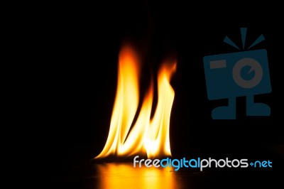 Burning Fire Flame On Black Background Stock Photo