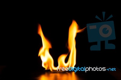 Burning Fire Flame On Black Background Stock Photo