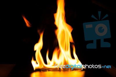 Burning Fire Flame On Black Background Stock Photo