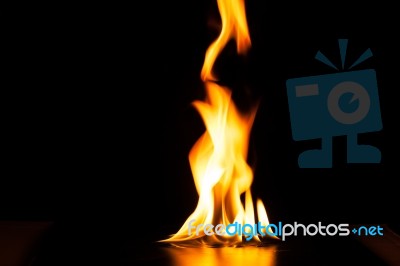 Burning Fire Flame On Black Background Stock Photo