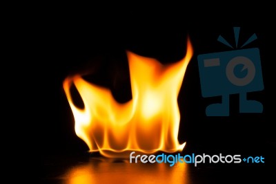 Burning Fire Flame On Black Background Stock Photo