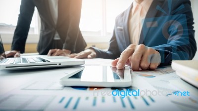 Business Adviser Analyzing Financial Figures Denoting The Progre… Stock Photo