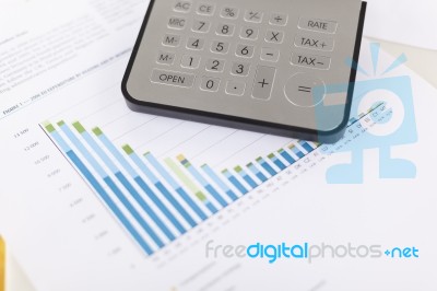 Business Analysis - Accounting Report With Calculator Stock Photo