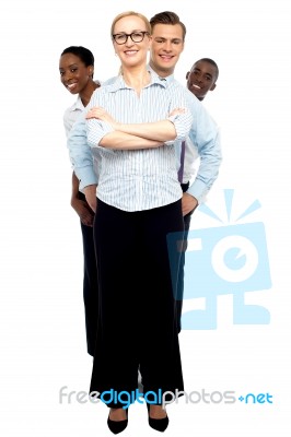 Business Associates Behind Woman Stock Photo