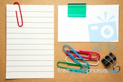 Business Card And Note With Paperclips Stock Photo