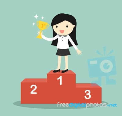 Business Concept, Business Woman Standing On The Winning Podium And Holding Trophy Stock Image