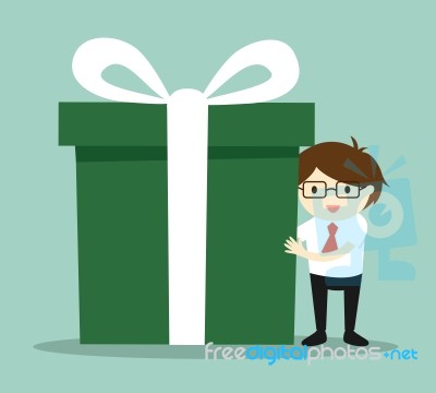 Business Concept, Businessman Holding A Big Gift Box For Christmas Festival Stock Image