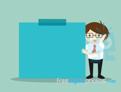 Business Concept, Businessman Holding Blue Sticky Note With Green Background Stock Image