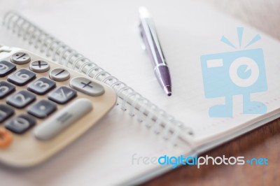 Business Concept With Calculator, Pen And Notebook Stock Photo