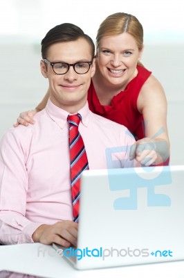 Business Couple with laptop Stock Photo