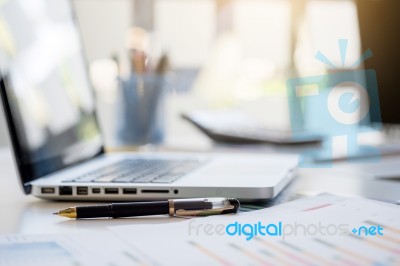 Business Desk With A Keyboard, Report Graph Chart, Pen And Table… Stock Photo