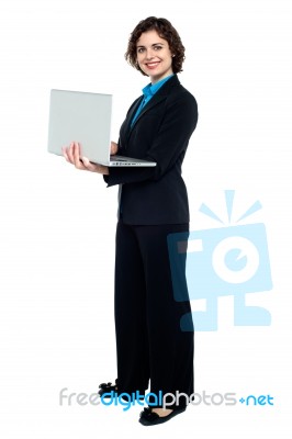 Business Executive Browsing On Laptop Stock Photo