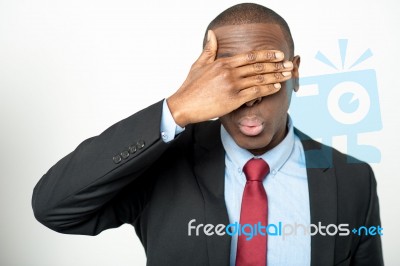 Business Executive Hiding His Eyes Stock Photo