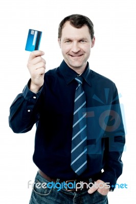 Business Executive Holding A Credit Card Stock Photo