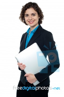 Business Executive Posing With Laptop Stock Photo