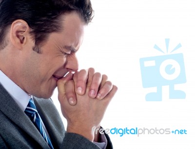 Business Executive Praying To God Stock Photo