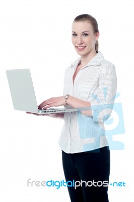 Business Executive Working On Laptop Stock Photo