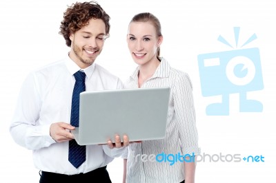 Business Executives Working On Laptop Stock Photo