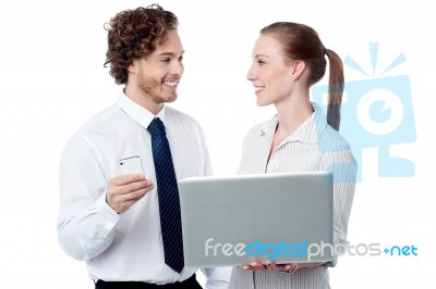 Business Executives Working On Laptop Stock Photo