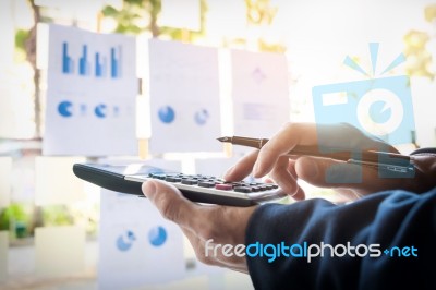 Business Finance Man Calculating Budget Numbers, Invoices And Fi… Stock Photo