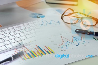 Business Graph And Pen Stock Photo