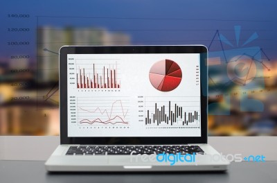 Business Graph On Laptop Stock Photo