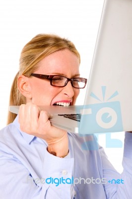 Business Lady Biting Laptop Stock Photo