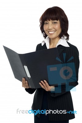 Business Lady Holding Opened Binder Stock Photo