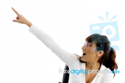 Business lady pointing upwards Stock Photo