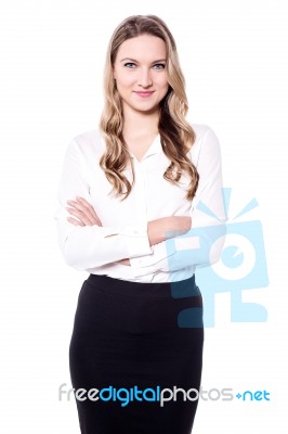 Business Lady Posing With Folded Arms Stock Photo