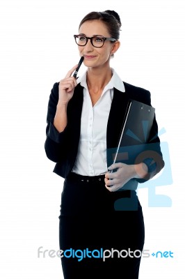 Business Lady Thinking Of Something Stock Photo