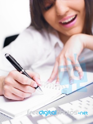 Business Lady Writing On Notebook Stock Photo