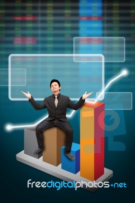 Business Man And Graph Report Stock Photo