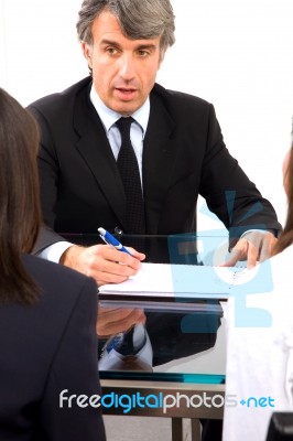 Business Man At Meeting Stock Photo