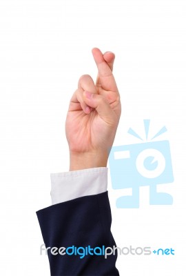 Business Man Finger Crossed Hand Sign Stock Photo