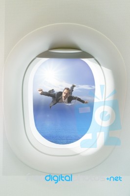 Business Man Floating Mid Air Out Side Passenger Plane Window Stock Photo