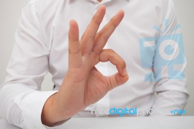 Business Man Giving Okay Sign Stock Photo