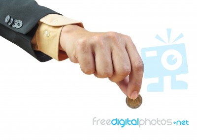 Business Man Hand Putting Coin On White Background Stock Photo