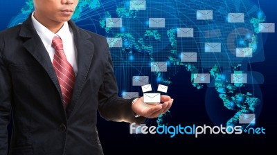 Business Man Holding Data And Information In Hand Stock Photo