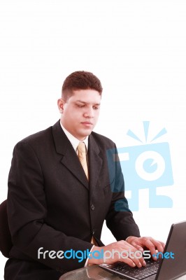 Business Man On Laptop In Office Stock Photo