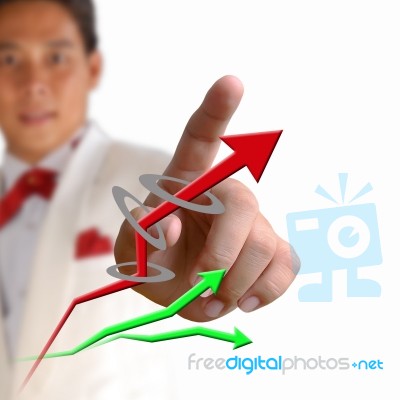 Business Man Pressing The Arrow Stock Photo